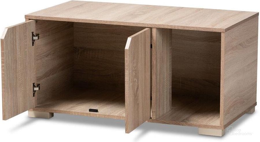 The appearance of Baxton Studio Jasper Modern and Contemporary Oak Finished 2-Door Wood Cat Litter Box Cover House designed by Baxton Studio in the modern / contemporary interior design. This oak piece of furniture  was selected by 1StopBedrooms from Jasper Collection to add a touch of cosiness and style into your home. Sku: SECHC150040WI-Hana Oak-Cat House. Material: MDF. Product Type: Miscellaneous. Image1