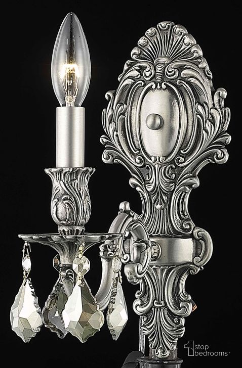 The appearance of Monarch 5 Pewter 1 Light Wall Sconce With Golden Teak Royal Cut Crystal Trim designed by Elegant Lighting in the glam interior design. This silver piece of furniture  was selected by 1StopBedrooms from Monarch Collection to add a touch of cosiness and style into your home. Sku: 9601W5PW-GT/RC. Product Type: Wall Sconce. Material: Crystal.