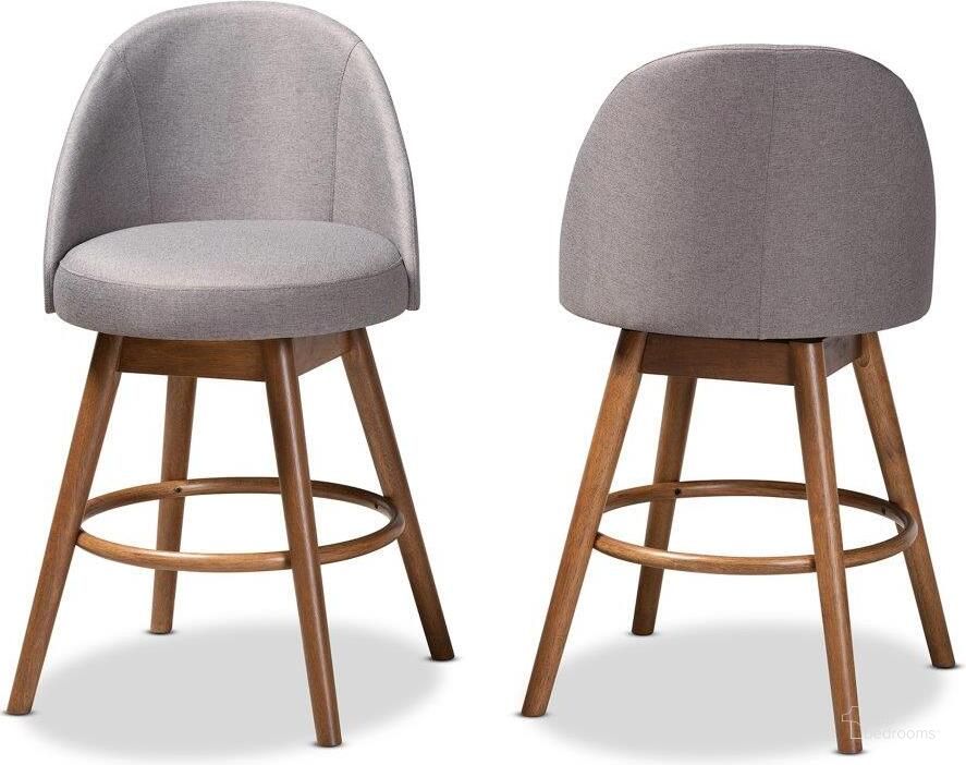 The appearance of Baxton Studio Carra Mid-Century Modern Grey Fabric Upholstered Walnut-Finished Wood Swivel Counter Stool Set of 2 designed by Baxton Studio in the transitional interior design. This gray piece of furniture  was selected by 1StopBedrooms from Carra Collection to add a touch of cosiness and style into your home. Sku: BBT5355C-Grey/Walnut-CS. Product Type: Counter Height Chair. Material: Rubberwood. Image1