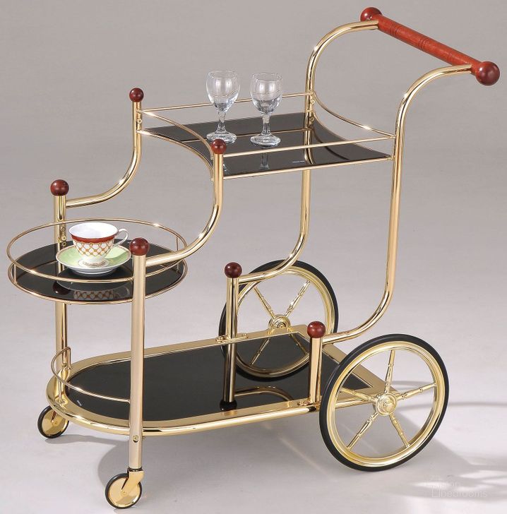 The appearance of Lacy Golden Plated and Black Glass Serving Cart designed by ACME in the modern / contemporary interior design. This gold piece of furniture  was selected by 1StopBedrooms from Lacy Collection to add a touch of cosiness and style into your home. Sku: 98006. Material: Metal. Product Type: Serving Cart.