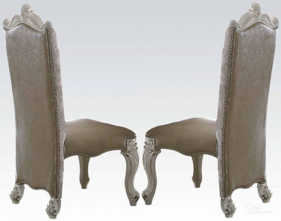 The appearance of Acme Versailles Side Chair in Vintage Gray PU/Fabric and Bone White (Set of 2) designed by ACME in the rustic / southwestern interior design. This bone white piece of furniture  was selected by 1StopBedrooms from Versailles Collection to add a touch of cosiness and style into your home. Sku: 61132. Product Type: Side Chair. Material: Vinyl. Image1