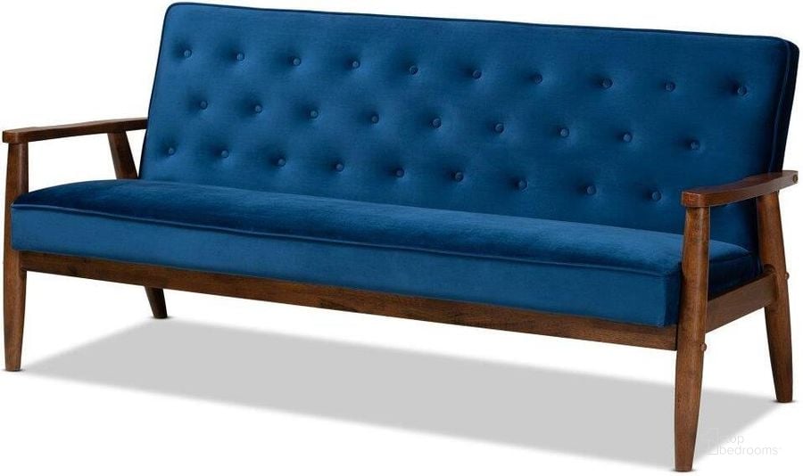 The appearance of Sorrento Mid-century Modern Navy Blue Velvet Fabric Upholstered Walnut Finished Wooden 3-seater Sofa designed by Baxton Studio in the transitional interior design. This blue piece of furniture  was selected by 1StopBedrooms from Sorrento Collection to add a touch of cosiness and style into your home. Sku: BBT8013-Navy Velvet/Walnut-SF. Material: Polyester. Product Type: Sofa. Image1