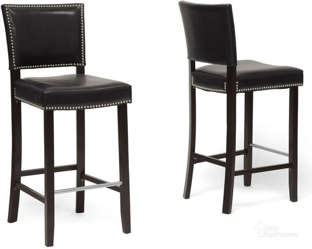 The appearance of Baxton Studio Aries Black Modern Bar Stool With Nail Head Trim (Set Of 2) designed by Baxton Studio in the transitional interior design. This black piece of furniture  was selected by 1StopBedrooms from Aries Collection to add a touch of cosiness and style into your home. Sku: BBT5112 Bar Stool-Black. Material: Wood. Product Type: Barstool. Image1