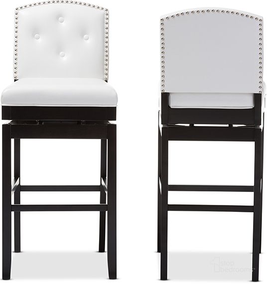 The appearance of Baxton Studio Ginaro Modern And Contemporary White Faux Leather Button-Tufted Upholstered Swivel Bar Stool (Set Of 2) designed by Baxton Studio in the modern / contemporary interior design. This white piece of furniture  was selected by 1StopBedrooms from Ginaro Collection to add a touch of cosiness and style into your home. Sku: BBT5220-White Stool. Material: MDF. Product Type: Barstool. Image1
