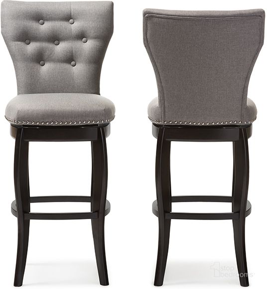 The appearance of Baxton Studio Leonice Modern and Contemporary Grey Fabric Upholstered Button-tufted 29-Inch 2-Piece Swivel Bar Stool Set designed by Baxton Studio in the modern / contemporary interior design. This grey piece of furniture  was selected by 1StopBedrooms from Leonice Collection to add a touch of cosiness and style into your home. Sku: BBT5222-Grey. Material: Fabric. Product Type: Barstool. Image1
