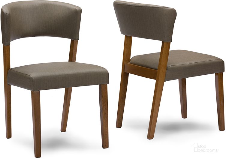 The appearance of Baxton Studio Montreal Mid-Century Dark Walnut Wood Grey Faux Leather Dining Chairs (Set Of 2) designed by Baxton Studio in the transitional interior design. This walnut piece of furniture  was selected by 1StopBedrooms from Montreal Collection to add a touch of cosiness and style into your home. Sku: RT281-CHR. Product Type: Dining Chair. Material: Rubberwood. Image1