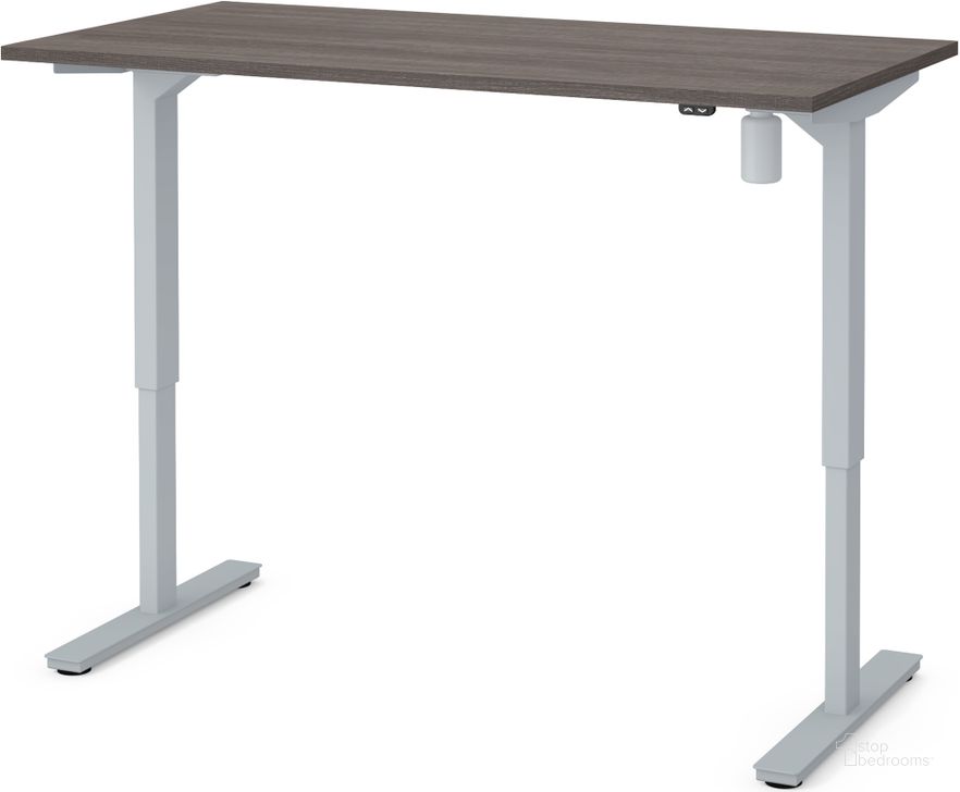 The appearance of Bestar 30" X 60" Electric Height Adjustable Table In Bark Gray designed by Bestar in the modern / contemporary interior design. This bark gray piece of furniture  was selected by 1StopBedrooms from Bestar Collection to add a touch of cosiness and style into your home. Sku: 65839-47. Material: Wood. Product Type: Adjustable Table. Image1