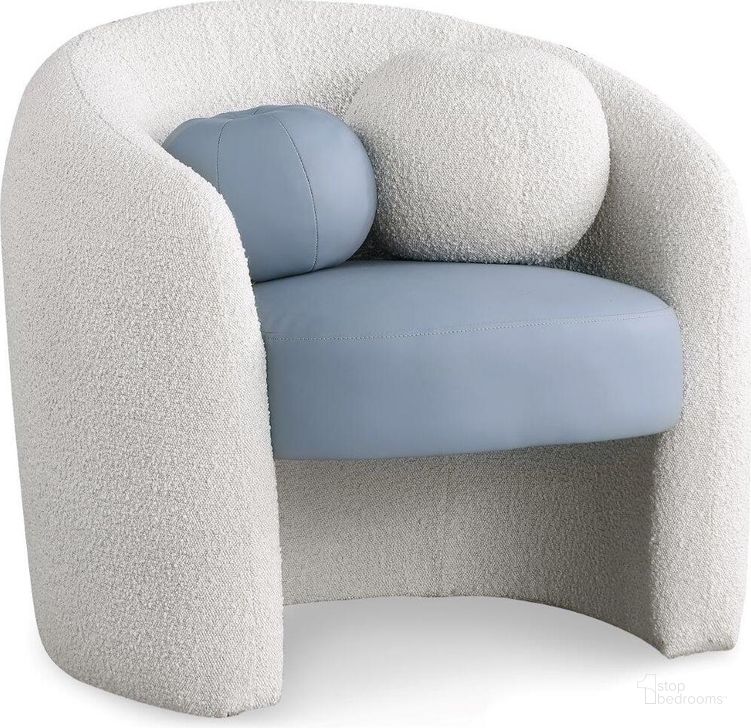 The appearance of Acadia Blue Faux Leather and Cream Boucle Fabric Accent Chair designed by Meridian in the modern / contemporary interior design. This blue piece of furniture  was selected by 1StopBedrooms from Acadia Collection to add a touch of cosiness and style into your home. Sku: 546Blue. Material: Faux Leather. Product Type: Accent Chair. Image1