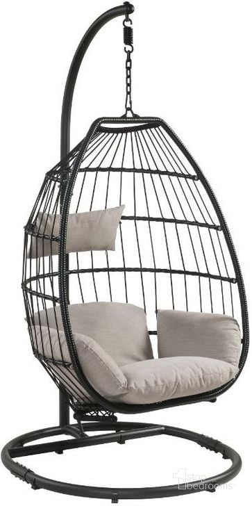 The appearance of Acme Oldi Patio Hanging Chair With Stand In Beige Fabric And Black Wicker designed by ACME in the modern / contemporary interior design. This beige piece of furniture  was selected by 1StopBedrooms from Oldi Collection to add a touch of cosiness and style into your home. Sku: 45115. Material: Metal. Product Type: Outdoor Chair. Image1