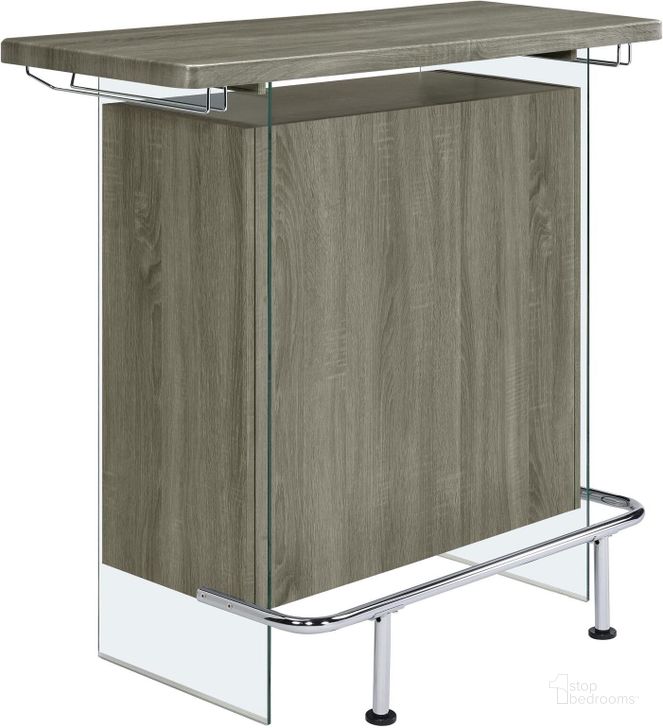 The appearance of Acosta Rectangular Bar Unit with Footrest and Glass Side Panels In Weathered Grey designed by Coaster in the modern / contemporary interior design. This weathered grey piece of furniture  was selected by 1StopBedrooms from Acosta Collection to add a touch of cosiness and style into your home. Sku: 182631. Material: Wood. Product Type: Home Bar. Image1
