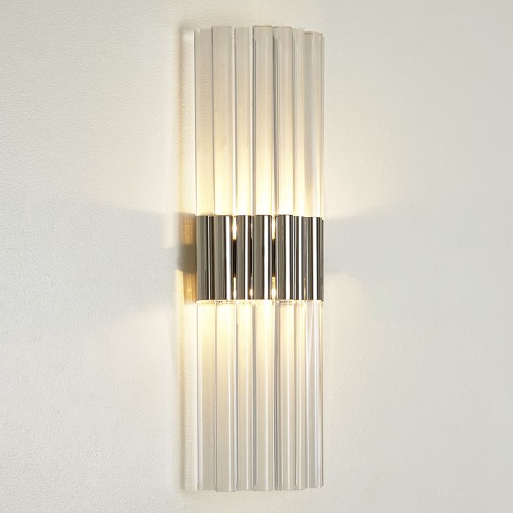 The appearance of Acrylic Sconce In Nickel designed by Global Views in the modern / contemporary interior design. This clear piece of furniture  was selected by 1StopBedrooms from Acrylic Collection to add a touch of cosiness and style into your home. Sku: 9.93590-HW. Product Type: Wall Sconce. Material: Acrylic. Image1