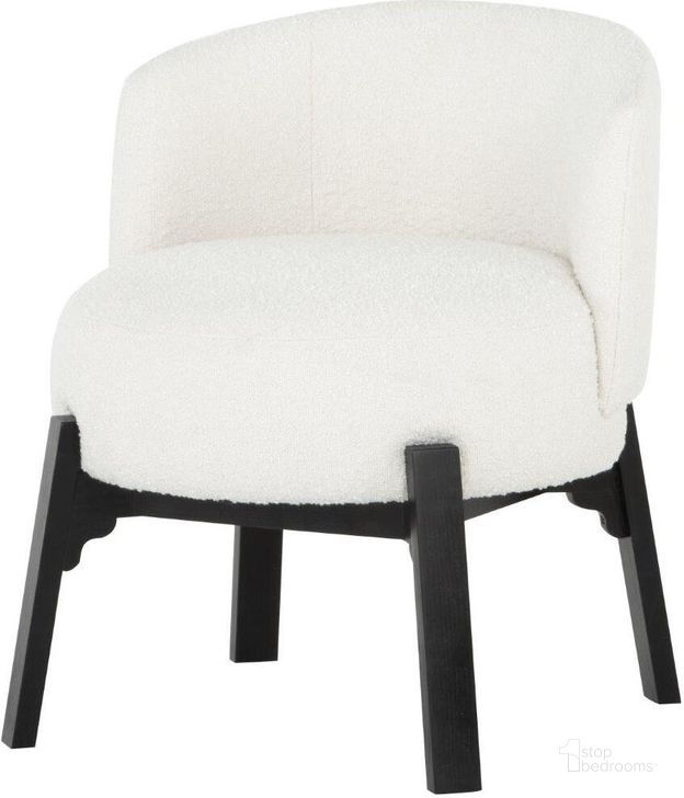 The appearance of Adelaide Buttermilk Boucle Dining Chair designed by Nuevo in the modern / contemporary interior design. This white piece of furniture  was selected by 1StopBedrooms from Adelaide Collection to add a touch of cosiness and style into your home. Sku: HGSN171. Material: Fabric. Product Type: Dining Chair. Image1
