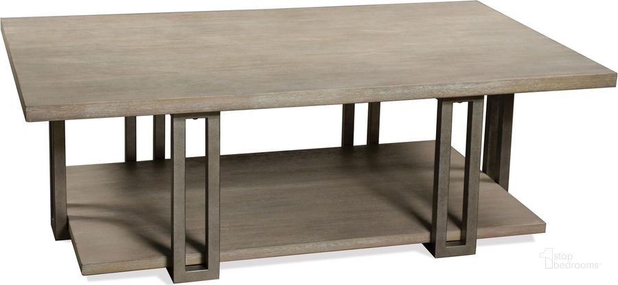 The appearance of Adelyn Crema Gray Rectangular Cocktail Table designed by Riverside Furniture in the modern / contemporary interior design. This gray piece of furniture  was selected by 1StopBedrooms from Adelyn Collection to add a touch of cosiness and style into your home. Sku: 88002. Product Type: Cocktail Table. Image1