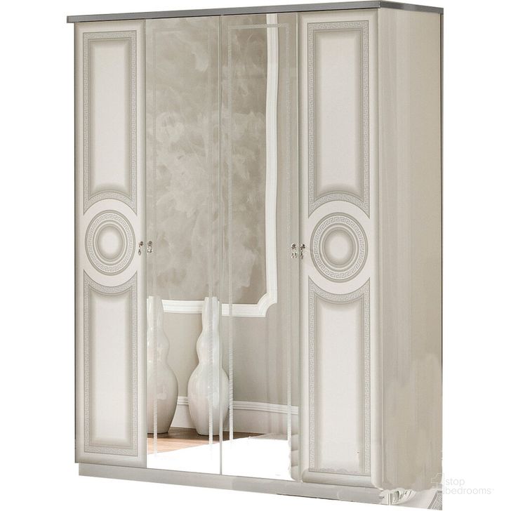 The appearance of Aida 4 Door Wardrobe (White and Silver) designed by ESF in the traditional interior design. This white piece of furniture  was selected by 1StopBedrooms from Aida Collection to add a touch of cosiness and style into your home. Sku: AIDA4DOORWDWHITESILV. Material: MDF. Product Type: Armoires and Wardrobe. Image1