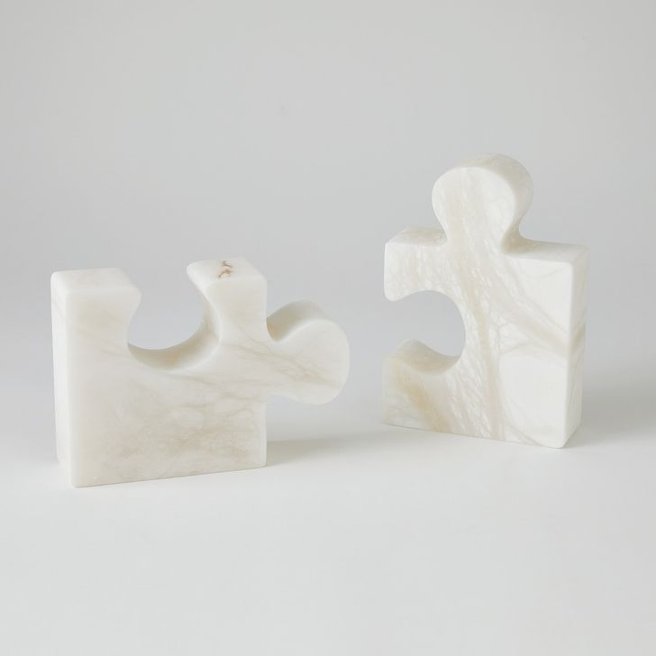 The appearance of Alabaster Jigsaw Bookends Set of 2 In White designed by Global Views in the modern / contemporary interior design. This white piece of furniture  was selected by 1StopBedrooms from Alabaster Collection to add a touch of cosiness and style into your home. Sku: 3.31755. Product Type: Bookends. Material: Alabaster. Image1