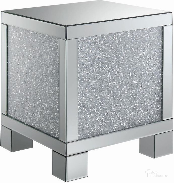 The appearance of Alcanoe Silver End Table 0qd2345615 designed by Luxury Loft in the modern / contemporary interior design. This silver piece of furniture  was selected by 1StopBedrooms from Alcanoe Collection to add a touch of cosiness and style into your home. Sku: 722497. Material: Glass. Product Type: End Table. Image1