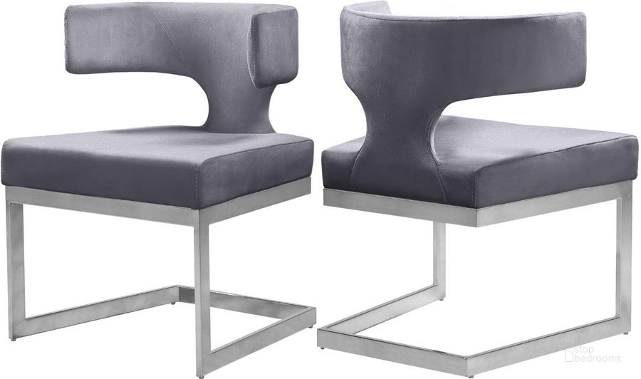 The appearance of Alexandra Grey Velvet Dining Chair 954Grey-C designed by Meridian in the modern / contemporary interior design. This grey velvet piece of furniture  was selected by 1StopBedrooms from Alexandra Collection to add a touch of cosiness and style into your home. Sku: 954Grey-C. Product Type: Dining Chair. Material: Velvet. Image1