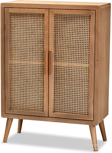 The appearance of Alina Mid-Century Modern Medium Oak Finished Wood And Rattan 2-Door Accent Storage Cabinet designed by Baxton Studio in the transitional interior design. This medium oak piece of furniture  was selected by 1StopBedrooms from Alina Collection to add a touch of cosiness and style into your home. Sku: JY1904-Medium Oak-Cabinet. Material: MDF. Product Type: Accent Cabinet. Image1