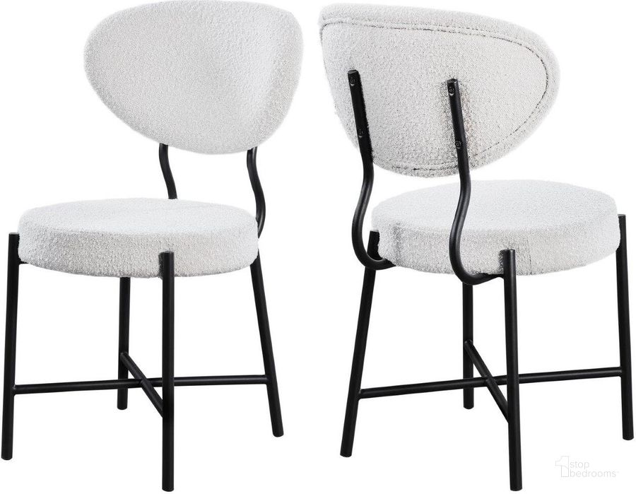 The appearance of Allure Cream Boucle Fabric Dining Chair Set Of 2 designed by Meridian in the modern / contemporary interior design. This cream piece of furniture  was selected by 1StopBedrooms from Allure Collection to add a touch of cosiness and style into your home. Sku: 579Cream-C. Material: Fabric. Product Type: Dining Chair. Image1