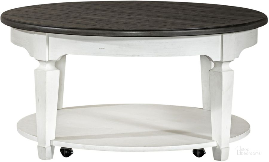 The appearance of Allyson Park Round Cocktail Table designed by Liberty in the country / farmhouse interior design. This white piece of furniture  was selected by 1StopBedrooms from Allyson Park Collection to add a touch of cosiness and style into your home. Sku: 417-OT1011. Product Type: Cocktail Table. Material: Solid Pine. Image1