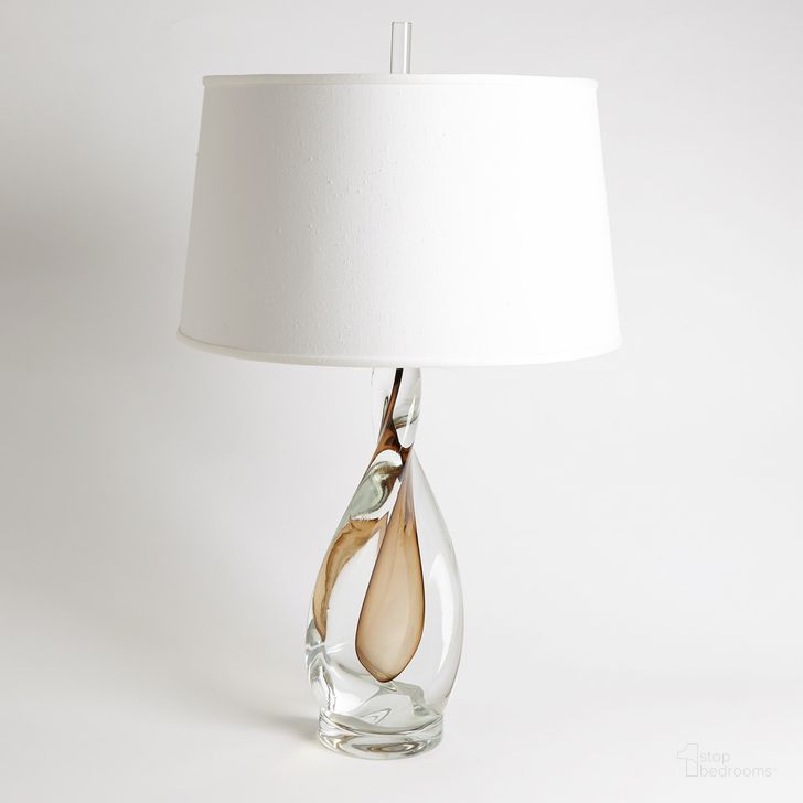 The appearance of Amber Twist Lamp With Silk Shade In Clear designed by Global Views in the modern / contemporary interior design. This clear piece of furniture  was selected by 1StopBedrooms from Amber Collection to add a touch of cosiness and style into your home. Sku: 7.6006. Material: Glass. Product Type: Lamp. Image1
