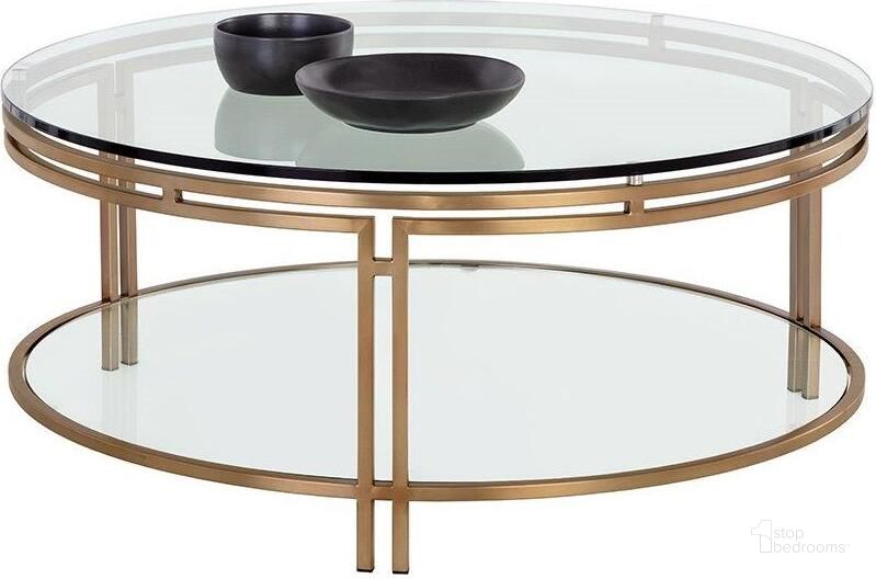 The appearance of Andros Coffee Table In Antique Brass designed by Sunpan in the modern / contemporary interior design. This antique brass piece of furniture  was selected by 1StopBedrooms from Andros Collection to add a touch of cosiness and style into your home. Sku: 108528. Material: Glass. Product Type: Coffee Table. Image1
