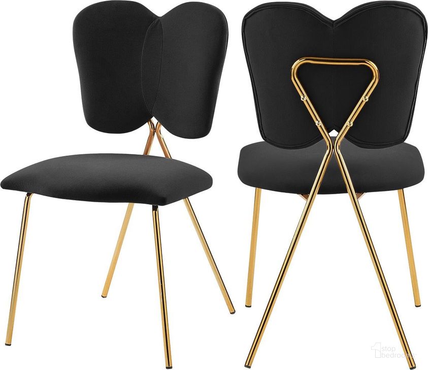 The appearance of Angel Black Velvet Dining Chair Set of 2 designed by Meridian in the modern / contemporary interior design. This black velvet piece of furniture  was selected by 1StopBedrooms from Angel Collection to add a touch of cosiness and style into your home. Sku: 780Black-C. Product Type: Dining Chair. Material: Velvet. Image1