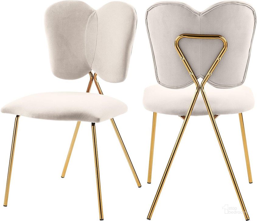 The appearance of Angel Cream Velvet Dining Chair Set of 2 designed by Meridian in the modern / contemporary interior design. This cream velvet piece of furniture  was selected by 1StopBedrooms from Angel Collection to add a touch of cosiness and style into your home. Sku: 780Cream-C. Product Type: Dining Chair. Material: Velvet. Image1