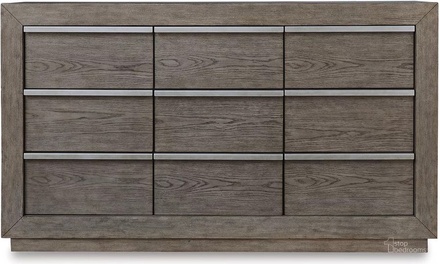 The appearance of Anibecca Weathered Grey Dresser designed by Signature Design by Ashley in the modern / contemporary interior design. This weathered gray piece of furniture  was selected by 1StopBedrooms from Anibecca Collection to add a touch of cosiness and style into your home. Sku: B970-31. Material: Wood. Product Type: Dresser. Image1