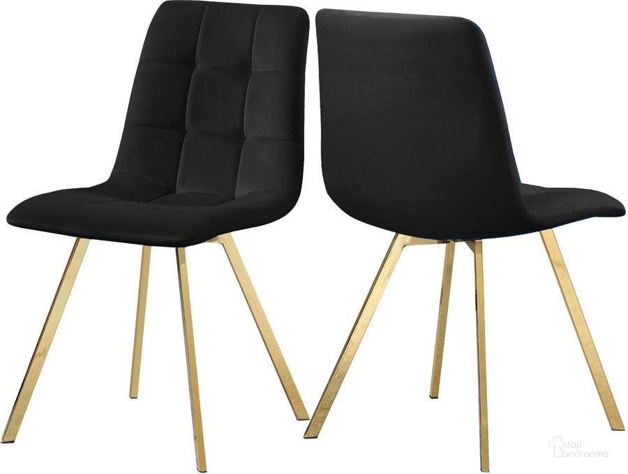 The appearance of Annie Black Velvet Dining Chair Set of 2 designed by Meridian in the modern / contemporary interior design. This black velvet piece of furniture  was selected by 1StopBedrooms from Annie Collection to add a touch of cosiness and style into your home. Sku: 979Black-C. Product Type: Dining Chair. Material: Velvet. Image1