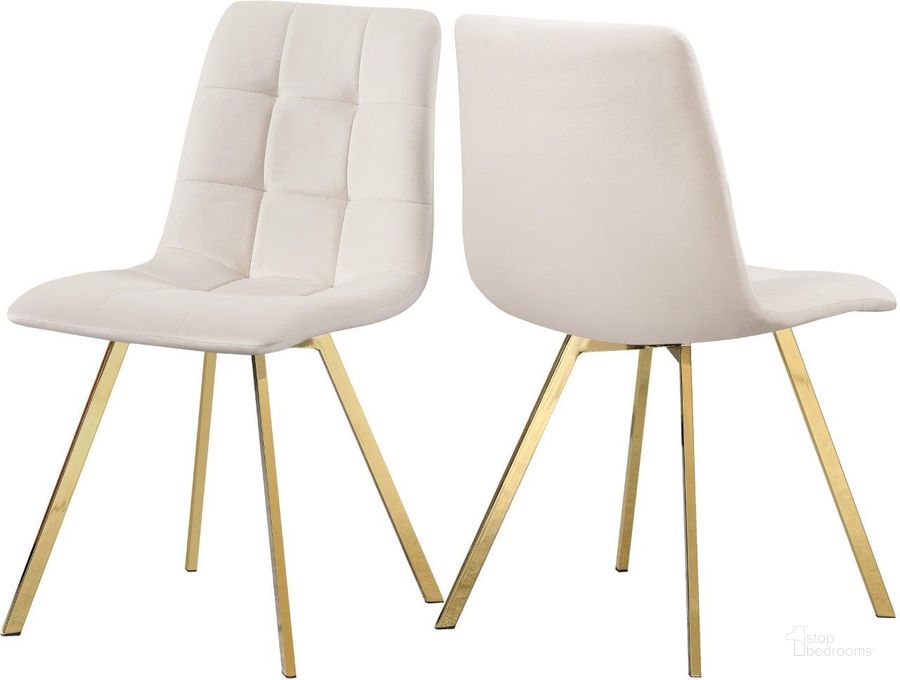 The appearance of Annie Cream Velvet Dining Chair Set of 2 designed by Meridian in the modern / contemporary interior design. This cream velvet piece of furniture  was selected by 1StopBedrooms from Annie Collection to add a touch of cosiness and style into your home. Sku: 979Cream-C. Product Type: Dining Chair. Material: Velvet. Image1