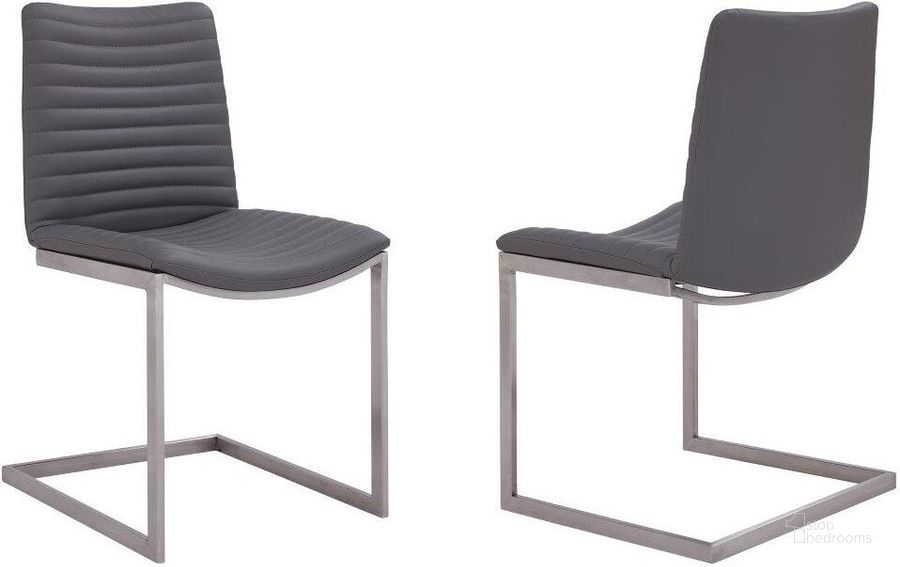 The appearance of April Grey Faux Leather Dining Chair Set Of 2 designed by Armen Living in the modern / contemporary interior design. This grey piece of furniture  was selected by 1StopBedrooms from April Collection to add a touch of cosiness and style into your home. Sku: LCAPSIBSGR. Product Type: Dining Chair. Material: Stainless Steel. Image1