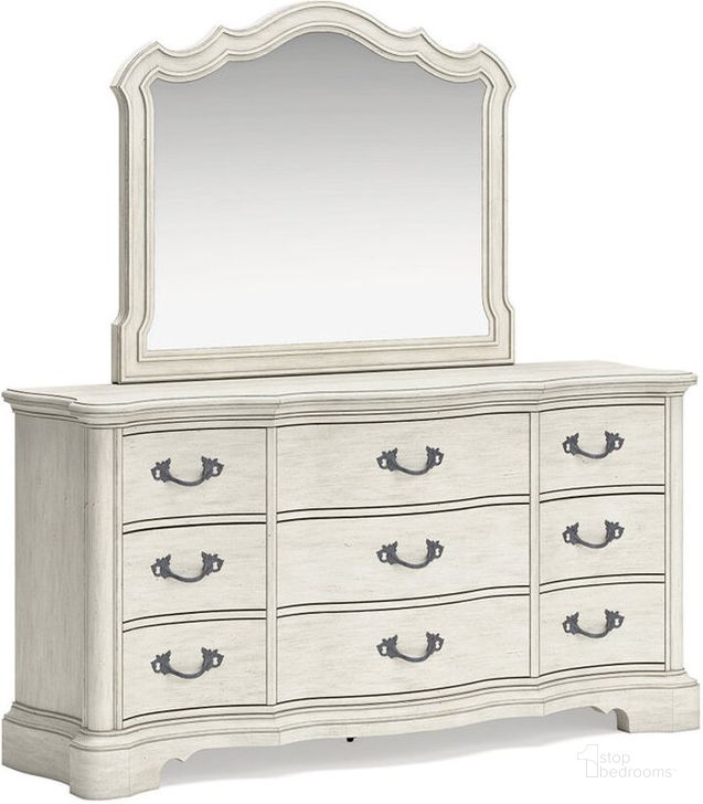 The appearance of Arlendyne Dresser and Mirror In Antique White designed by Signature Design by Ashley in the traditional interior design. This antique white piece of furniture  was selected by 1StopBedrooms from Arlendyne Collection to add a touch of cosiness and style into your home. Sku: B980-31;B980-36. Material: Wood. Product Type: Dresser and Mirror. Image1