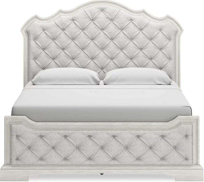 The appearance of Arlendyne King Upholstered Bed In Antique White designed by Signature Design by Ashley in the traditional interior design. This antique white piece of furniture  was selected by 1StopBedrooms from Arlendyne Collection to add a touch of cosiness and style into your home. Sku: B980-56;B980-58;B980-97. Bed Type: Panel Bed. Material: Fabric. Product Type: Panel Bed. Bed Size: King. Image1
