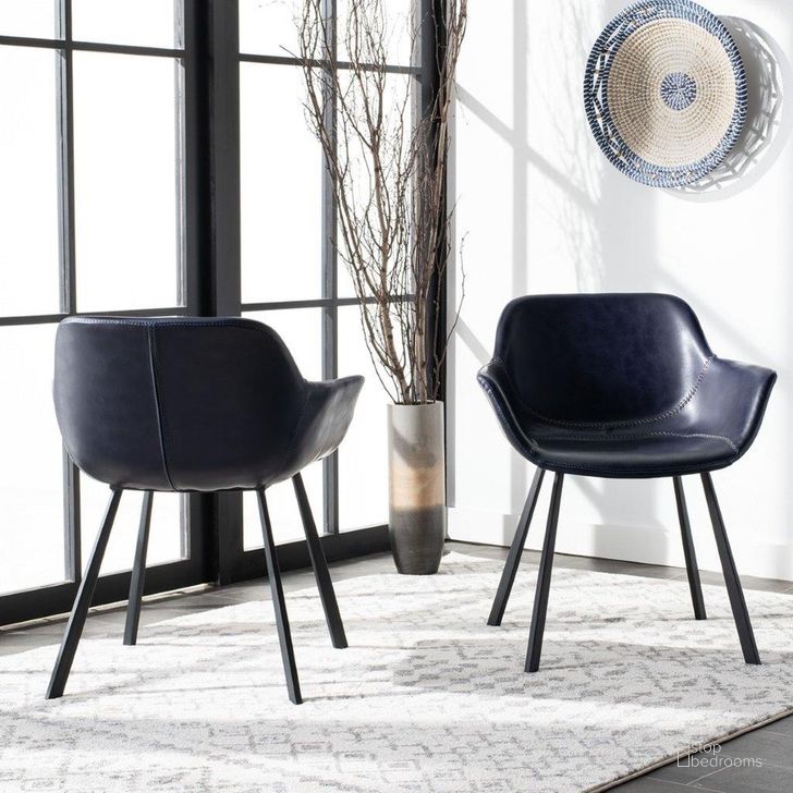 The appearance of Arlo Midnight Blue Mid Century Dining Chair designed by Safavieh in the modern / contemporary interior design. This midnight blue piece of furniture  was selected by 1StopBedrooms from Wyatt Collection to add a touch of cosiness and style into your home. Sku: DCH3002A-SET2. Product Type: Dining Chair. Material: Iron. Image1