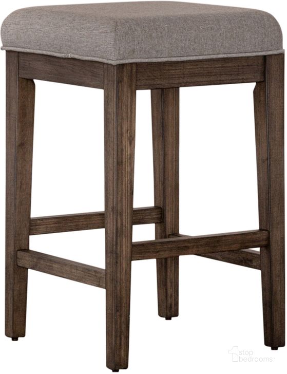 The appearance of Arrowcreek Upholstered Console Stool designed by Liberty in the rustic / southwestern interior design. This weathered stone piece of furniture  was selected by 1StopBedrooms from Arrowcreek Collection to add a touch of cosiness and style into your home. Sku: 226-OT9001. Product Type: Barstool. Material: Solid Pine. Image1