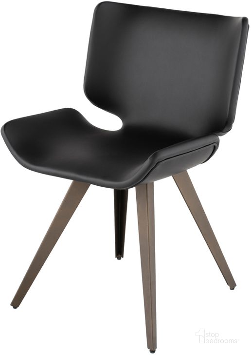 The appearance of Astra Black Naugahyde Dining Chair designed by Nuevo in the modern / contemporary interior design. This black piece of furniture  was selected by 1StopBedrooms from Astra Collection to add a touch of cosiness and style into your home. Sku: HGNE127. Product Type: Dining Chair. Material: Naugahyde. Image1