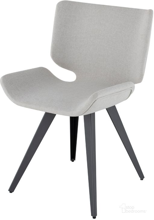 The appearance of Astra Stone Grey Fabric Dining Chair designed by Nuevo in the modern / contemporary interior design. This stone grey piece of furniture  was selected by 1StopBedrooms from Astra Collection to add a touch of cosiness and style into your home. Sku: HGNE128. Material: Fabric. Product Type: Dining Chair. Image1
