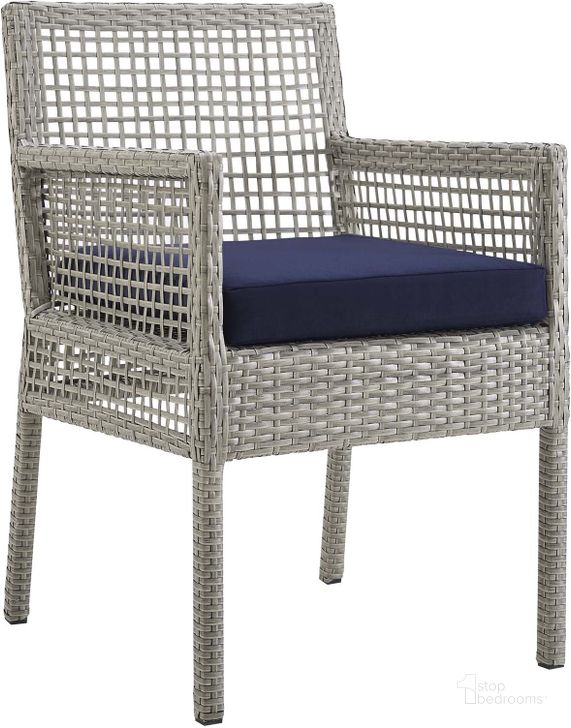 The appearance of Aura Gray Navy Outdoor Patio Wicker Rattan Dining Arm Chair designed by Modway in the modern / contemporary interior design. This gray navy piece of furniture  was selected by 1StopBedrooms from Aura Collection to add a touch of cosiness and style into your home. Sku: EEI-2920-GRY-NAV. Material: Rattan. Product Type: Outdoor Dining Chair. Image1