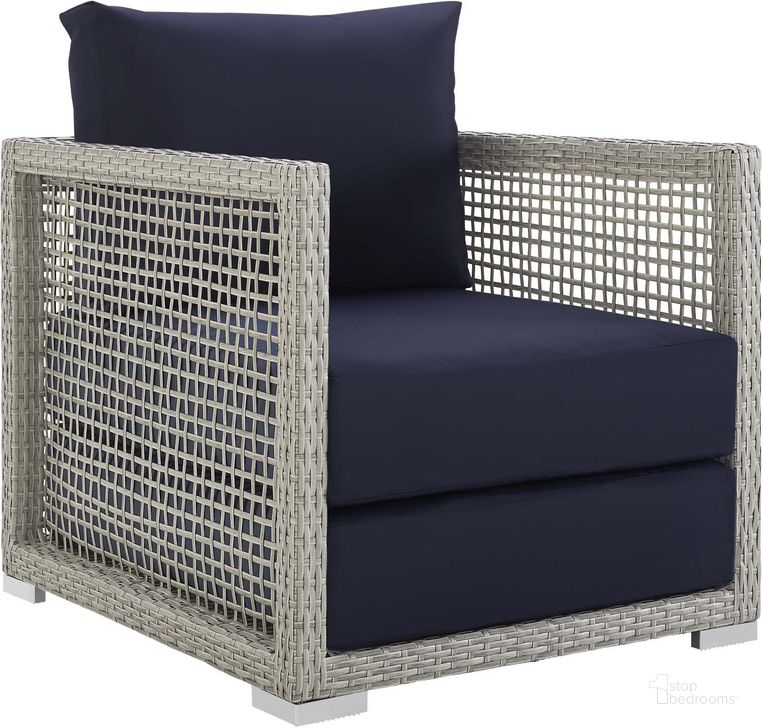 The appearance of Aura Gray Navy Rattan Outdoor Patio Arm Chair designed by Modway in the modern / contemporary interior design. This gray navy piece of furniture  was selected by 1StopBedrooms from Aura Collection to add a touch of cosiness and style into your home. Sku: EEI-2918-GRY-NAV. Product Type: Outdoor Dining Chair. Material: Foam. Image1