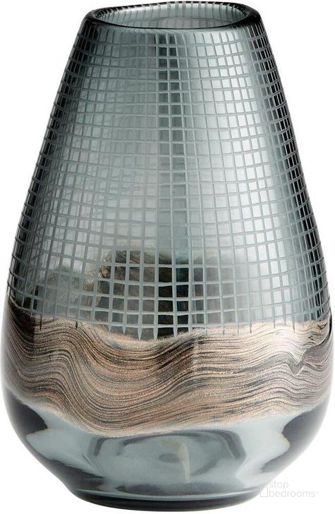 The appearance of Axiom Clear And Glitter Gold Large Vase designed by Cyan Design in the modern / contemporary interior design. This silver and grey piece of furniture  was selected by 1StopBedrooms from Axiom Collection to add a touch of cosiness and style into your home. Sku: 09971. Material: Glass. Product Type: Vase.