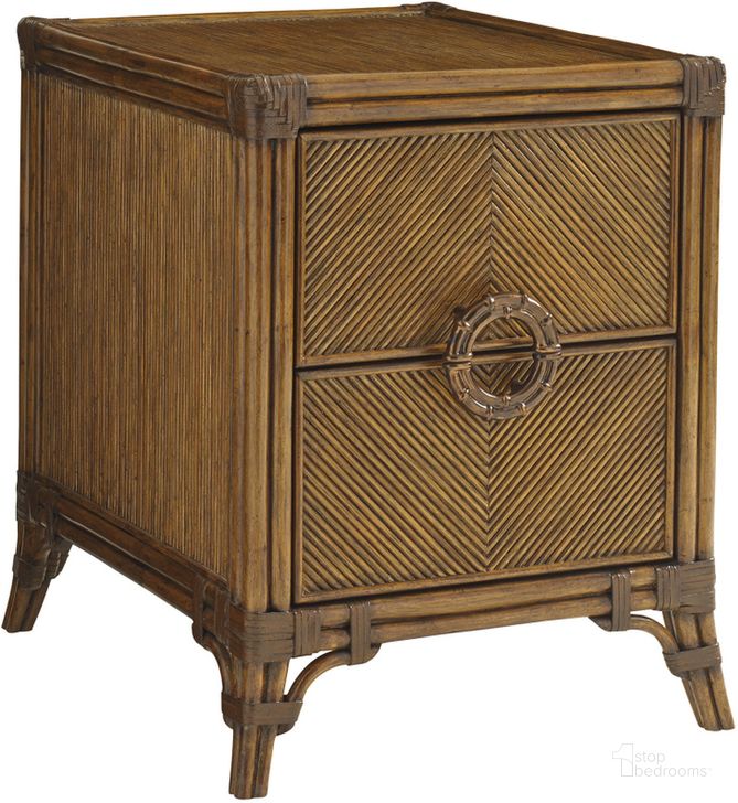 The appearance of Bali Hai Bungalow Chairside Chest designed by Tommy Bahama in the transitional interior design. This brown piece of furniture  was selected by 1StopBedrooms from Bali Hai Collection to add a touch of cosiness and style into your home. Sku: 01-0593-957. Product Type: End Table. Material: Rattan. Image1