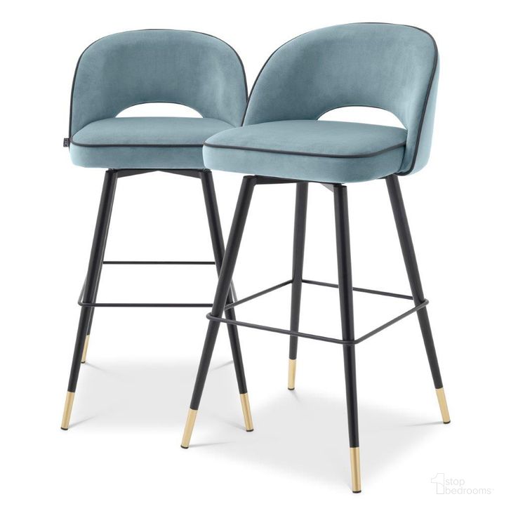 The appearance of Bar Stool In Cliff Savona Blue Velvet Set Of 2 designed by Eichholtz in the modern / contemporary interior design. This blue piece of furniture  was selected by 1StopBedrooms from Cliff Collection to add a touch of cosiness and style into your home. Sku: A114316. Material: Leather. Product Type: Barstool. Image1