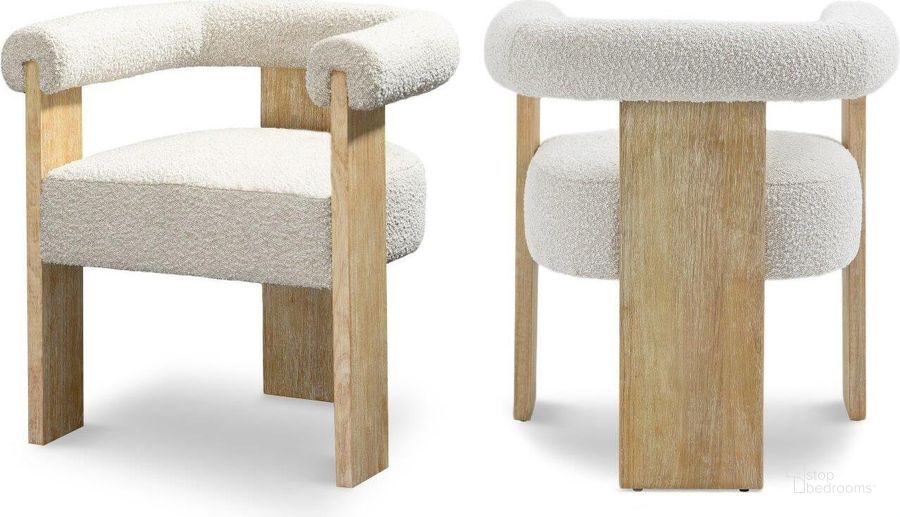 The appearance of Barrel Cream Boucle Fabric Dining Chair 566Cream-C designed by Meridian in the transitional interior design. This natural piece of furniture  was selected by 1StopBedrooms from Barrel Collection to add a touch of cosiness and style into your home. Sku: 566Cream-C. Product Type: Dining Chair. Material: Rubberwood. Image1