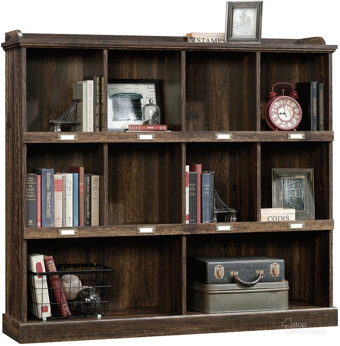 The appearance of Barrister Lane Bookcase In Iron Oak designed by Sauder in the country / farmhouse interior design. This iron oak piece of furniture  was selected by 1StopBedrooms from Barrister Lane Collection to add a touch of cosiness and style into your home. Sku: 422717. Product Type: Bookcase. Material: Engineered Wood. Image1