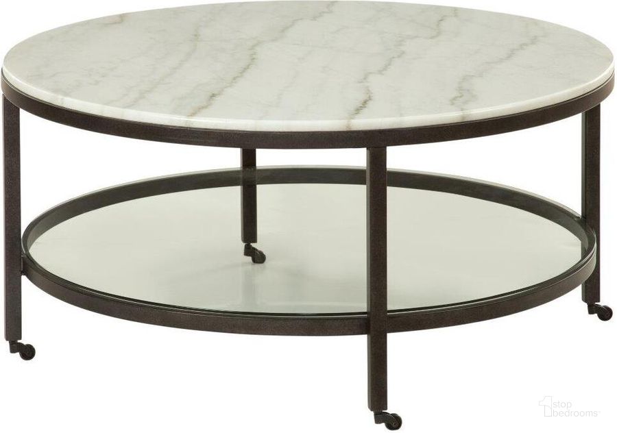 The appearance of Whitman Bronze Round Cocktail Table designed by Bassett Mirror Company in the transitional interior design. This bronze piece of furniture  was selected by 1StopBedrooms from Whitman Collection to add a touch of cosiness and style into your home. Sku: 1112-LR-120. Material: Marble. Product Type: Cocktail Table.