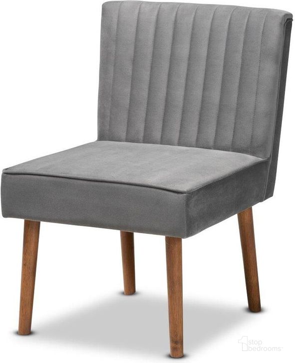 The appearance of Baxton Studio Alvis Mid-Century Modern Grey Velvet Upholstered And Walnut Brown Finished Wood Dining Chair designed by Baxton Studio in the transitional interior design. This grey piece of furniture  was selected by 1StopBedrooms from Alvis Collection to add a touch of cosiness and style into your home. Sku: BBT8063-Grey Velvet/Walnut-CC. Product Type: Dining Chair. Material: Plywood. Image1