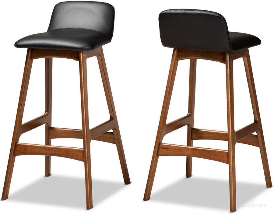 The appearance of Baxton Studio Darrin Mid Century Modern Black Faux Leather Upholstered And Walnut Brown Finished Wood 2 Piece Bar Stool Set designed by Baxton Studio in the transitional interior design. This walnut and black piece of furniture  was selected by 1StopBedrooms from Darrin Collection to add a touch of cosiness and style into your home. Sku: Hua-Black/Walnut-BS. Product Type: Barstool. Material: Rubberwood. Image1