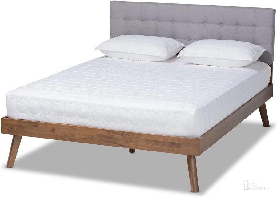 The appearance of Baxton Studio Devan Mid-Century Modern Light Grey Fabric Upholstered Walnut Brown Finished Wood Full Size Platform Bed designed by Baxton Studio in the transitional interior design. This light grey piece of furniture  was selected by 1StopBedrooms from Devan Collection to add a touch of cosiness and style into your home. Sku: SW8168-Light Grey/Walnut-M17-Full. Bed Type: Platform Bed. Product Type: Platform Bed. Bed Size: Full. Material: Rubberwood. Image1