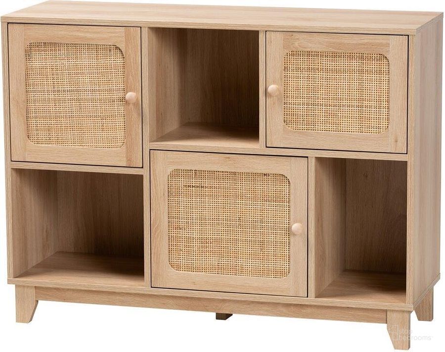 The appearance of Baxton Studio Elsbeth Mid Century Modern Light Brown Finished Wood and Natural Rattan 3 Door Sideboard designed by Baxton Studio in the transitional interior design. This brown piece of furniture  was selected by 1StopBedrooms from Elsbeth Collection to add a touch of cosiness and style into your home. Sku: LC22040705-Rattan-Sideboard. Material: Wood. Product Type: Sideboard. Image1